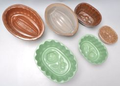 A selection of 19th Century Victorian ceramic staffordshire jelly moulds, each having impressed
