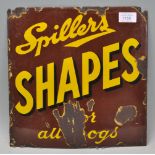 An early 20th Century enamel advertising sign for Spillers Shapes having brown ground with yellow