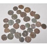 A collection of 33 Various Roman and Greek Coins of hammered type, many with details remaining.