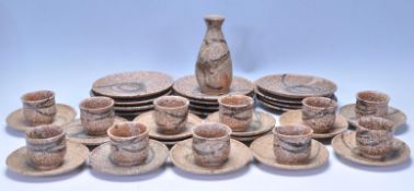 A vintage retro 20th Century Cornish studio art pottery coffee service comprising cups, saucers