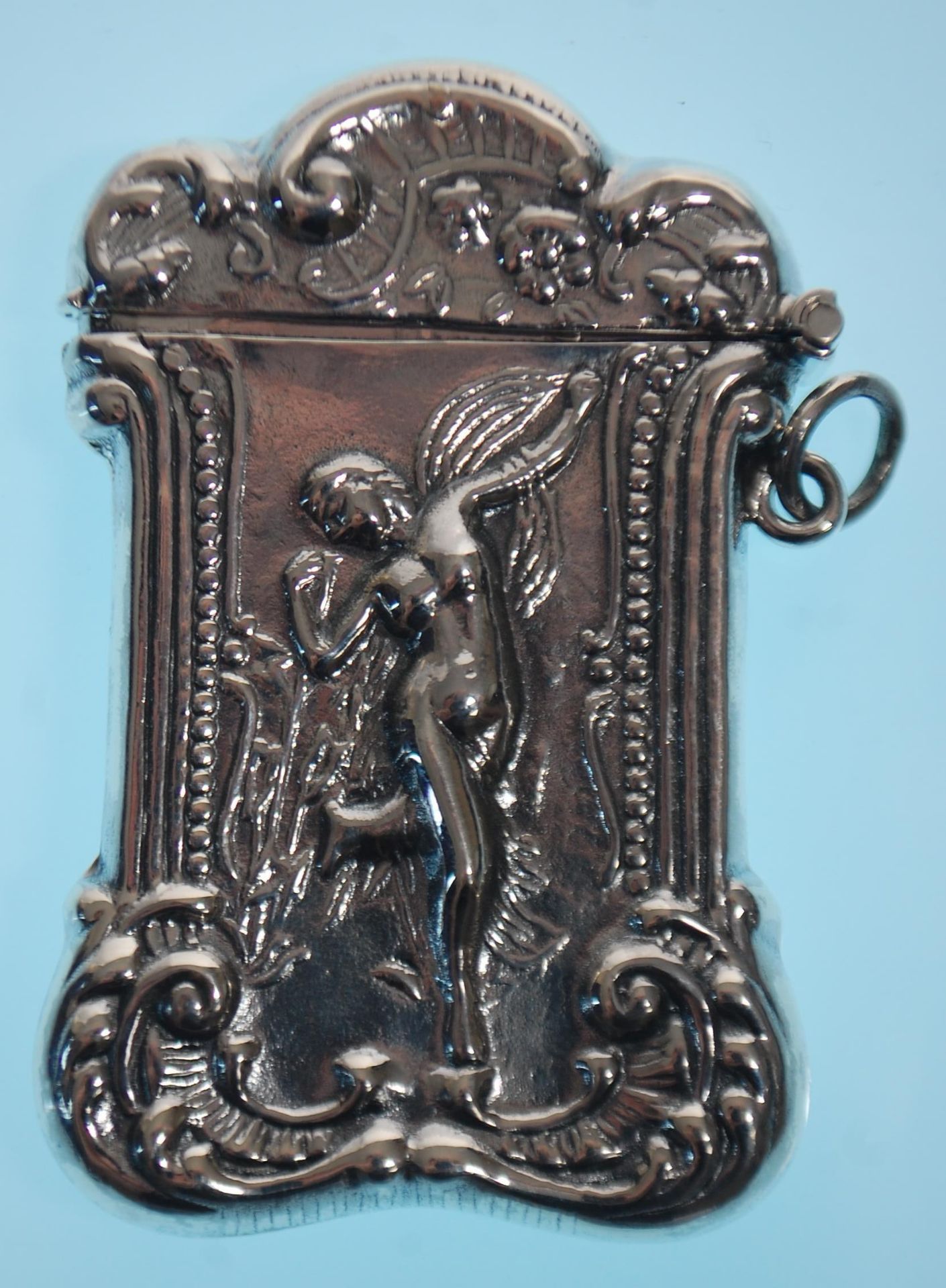 A stamped 925 silver vesta case having a repousse decoration fairy with scrolled borders. Measures - Image 3 of 7