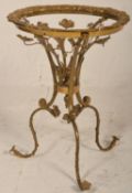 A 20th Century French occasional / side table frame having a round top raised on three scrolled legs