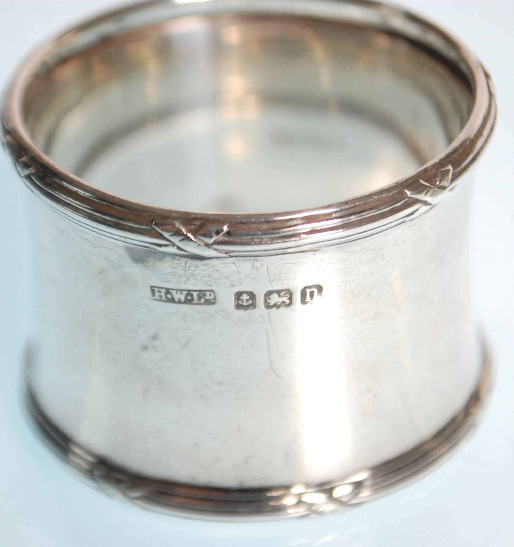 Two silver hallmarked napkin rings to include one with gadrooned borders and engraved initials to - Image 3 of 6