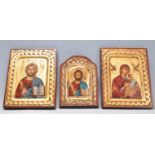 A contomary group of three antique Byzantine style icons with gilt and red borders. Each bearing