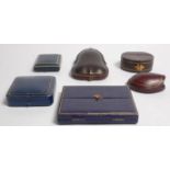 A group of six early 20th Century antique jewellery boxes of varying sizes and shapes, being