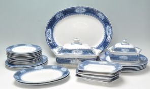 An early 20th Century Coronaware SHancock & Sons blue and white part dinner service having blue