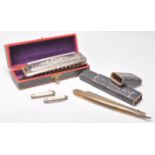 A vintage Hohner Super Chromonica harmonica in its original box together with a Joseph Rogers & Sons