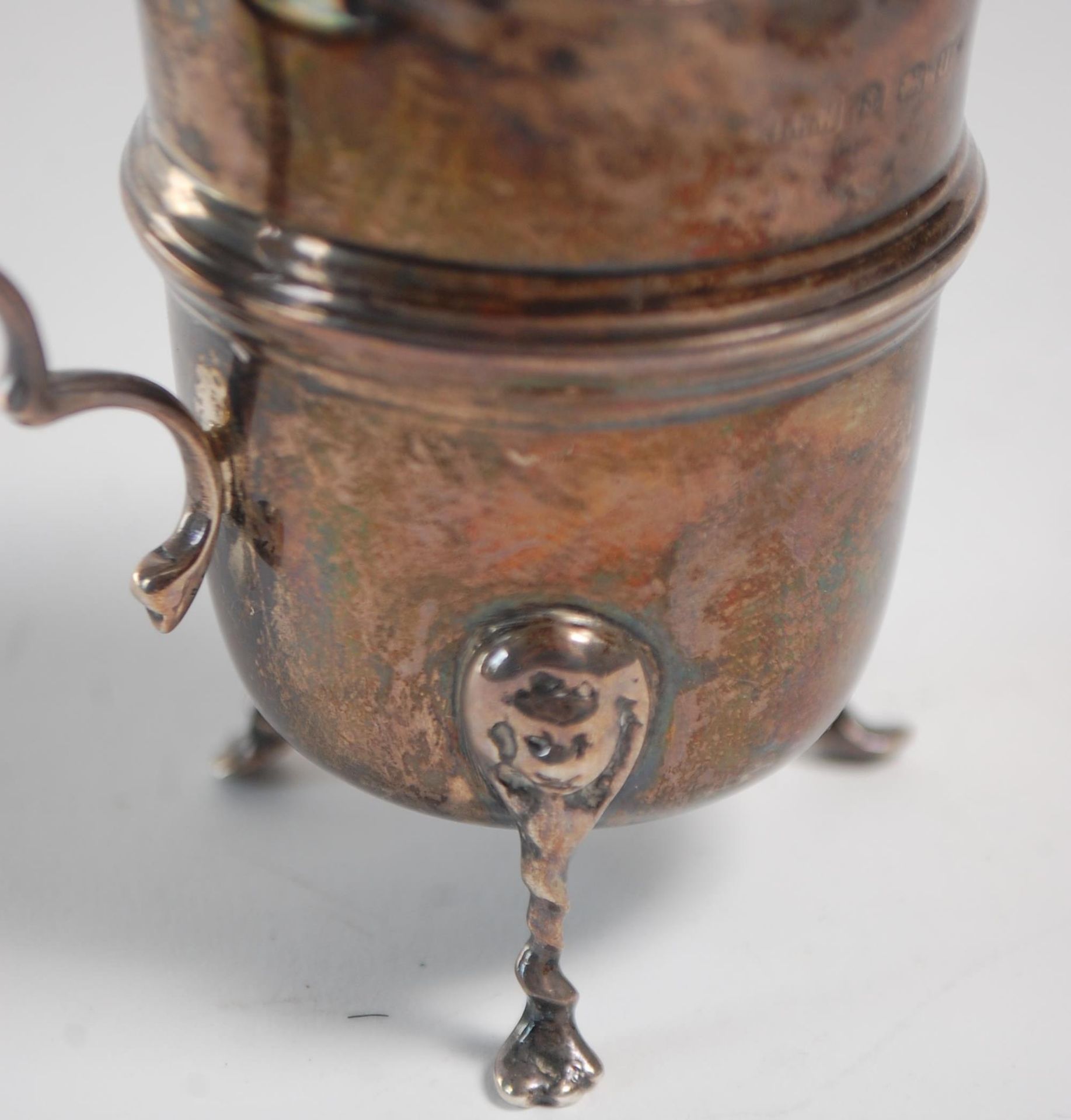 An early 20th Century silver hallmarked creamer jug having a flared top with banded center raised on - Image 9 of 9