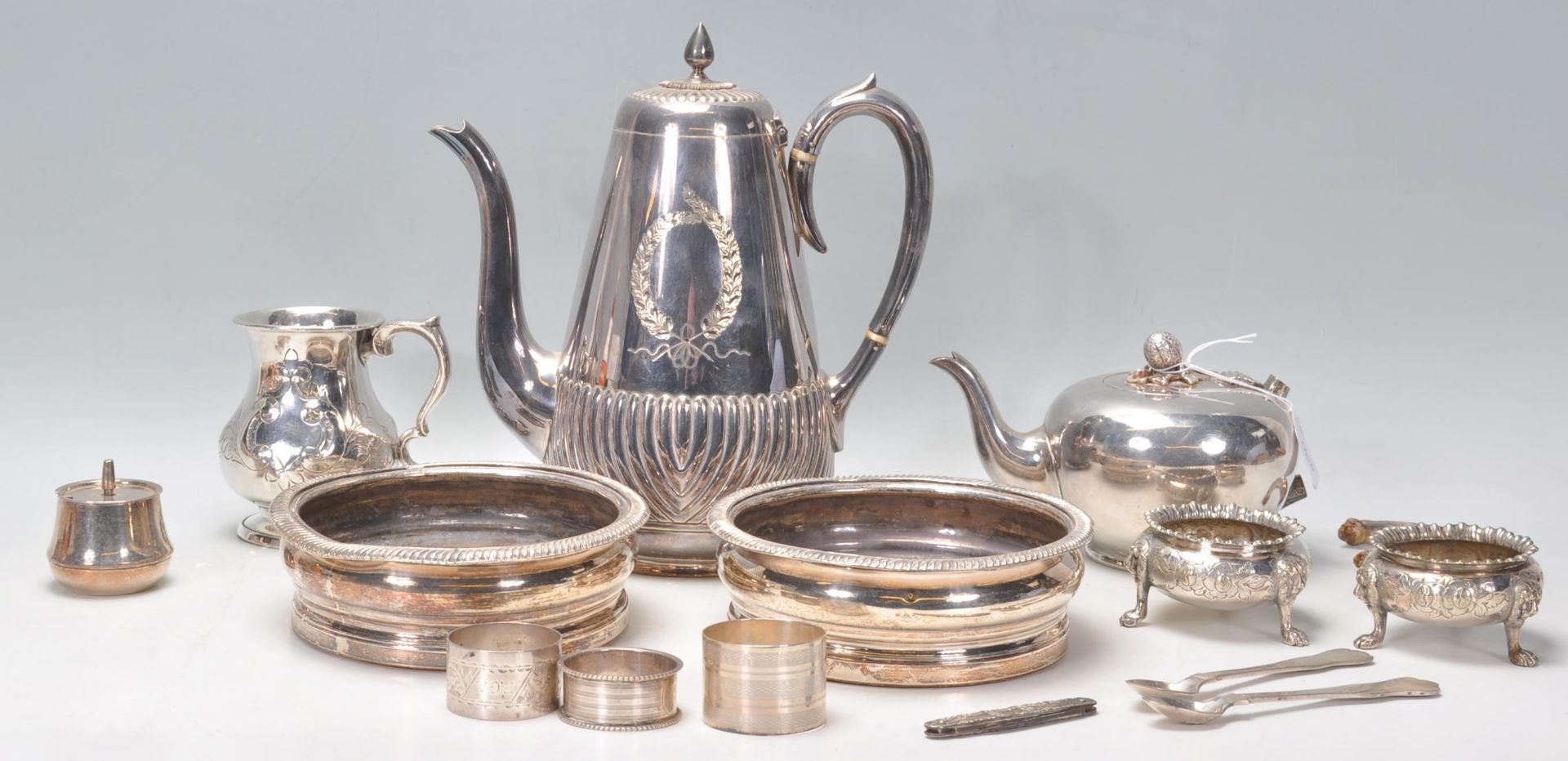 A good mixed group of silverplate and silver items dating from the 19th Century to include three