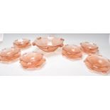 A set of six early 20th Century Art Deco pink frosted glass fruit bowls and plates together with