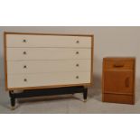 E. Gomme- G Plan- Brandon Range- A retro 20th Century light oak chest of drawers raised on