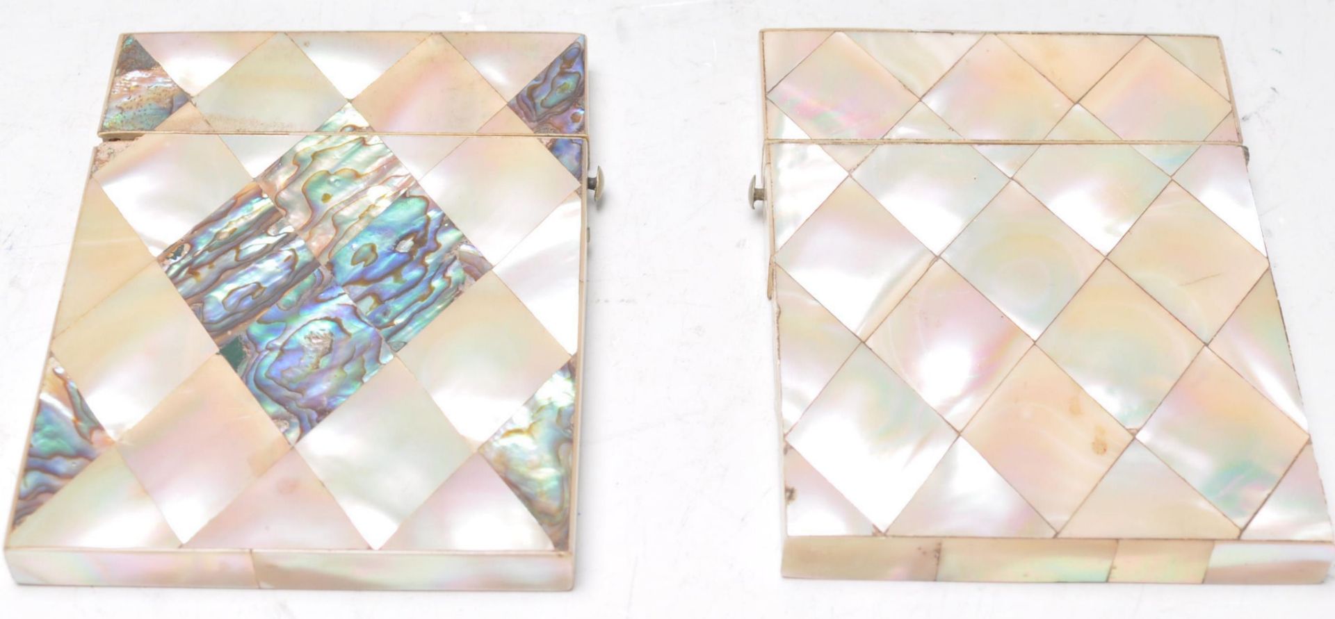 Two 19th Century mother of pearl card cases of rectangular form with both having push button catches