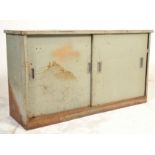 A good retro mid 20th Century Industrial metal cupboard / cabinet raised on a metal plint base