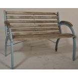 A 20th century metal Industrial style teak wood slatted garden bench. Each metal end in sky blue