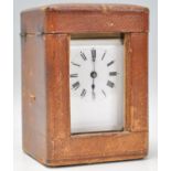 A late 19th Century French brass cased carriage clock having a white face with Roman numeral chapter