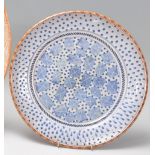 Morgen Hall - a studio art pottery plate tin glazed in blue and white, hand painted with geometric