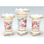 A 19th century Victorian porcelain 3 piece garniture vase set in the manner of Minton. Each of