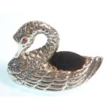 A stamped 925 silver pin cushion in the form of a swan with moulded feathers, having a blue