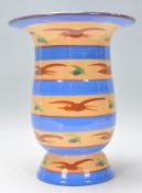 A retro vintage 20th Century Bavaria pottery vase having blue and yellow bands with painted birds.