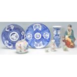 A mixed group of Chinese ceramics dating from the late 19th Century to include a blue and white vase