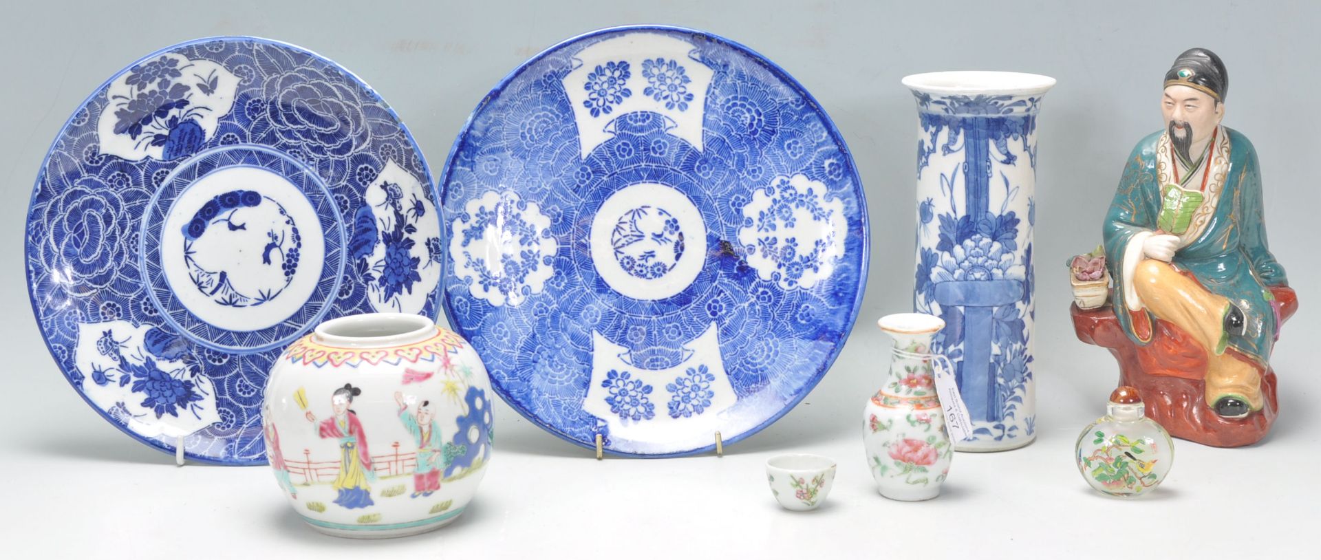 A mixed group of Chinese ceramics dating from the late 19th Century to include a blue and white vase