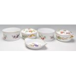 A collection of Royal Worcester Evesham ceramics to include two bowls, two tureens and a service