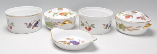 A collection of Royal Worcester Evesham ceramics to include two bowls, two tureens and a service