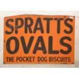 A vintage early 20th Century enamel advertising sign for ' Spratt's Ovals The Pocket Dog
