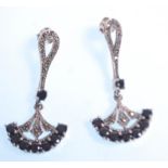 A pair of ladies art deco style dress earrings having fan shaped drops set with marcasites and round