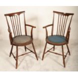 A pair of Victorian 19th century Goldsmith Windsor chairs - armchairs. Raised on turned legs
