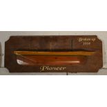 A collection of 3 wooden painted half hulls. To include Hope Town, Pioneer - Broken up 1919 and