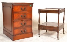 An antique style mahogany and leather office filin