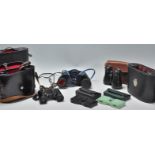 A mixed collection of binoculars to include a pair of Chinon 10X50, Imop Sport 8X30, Russian