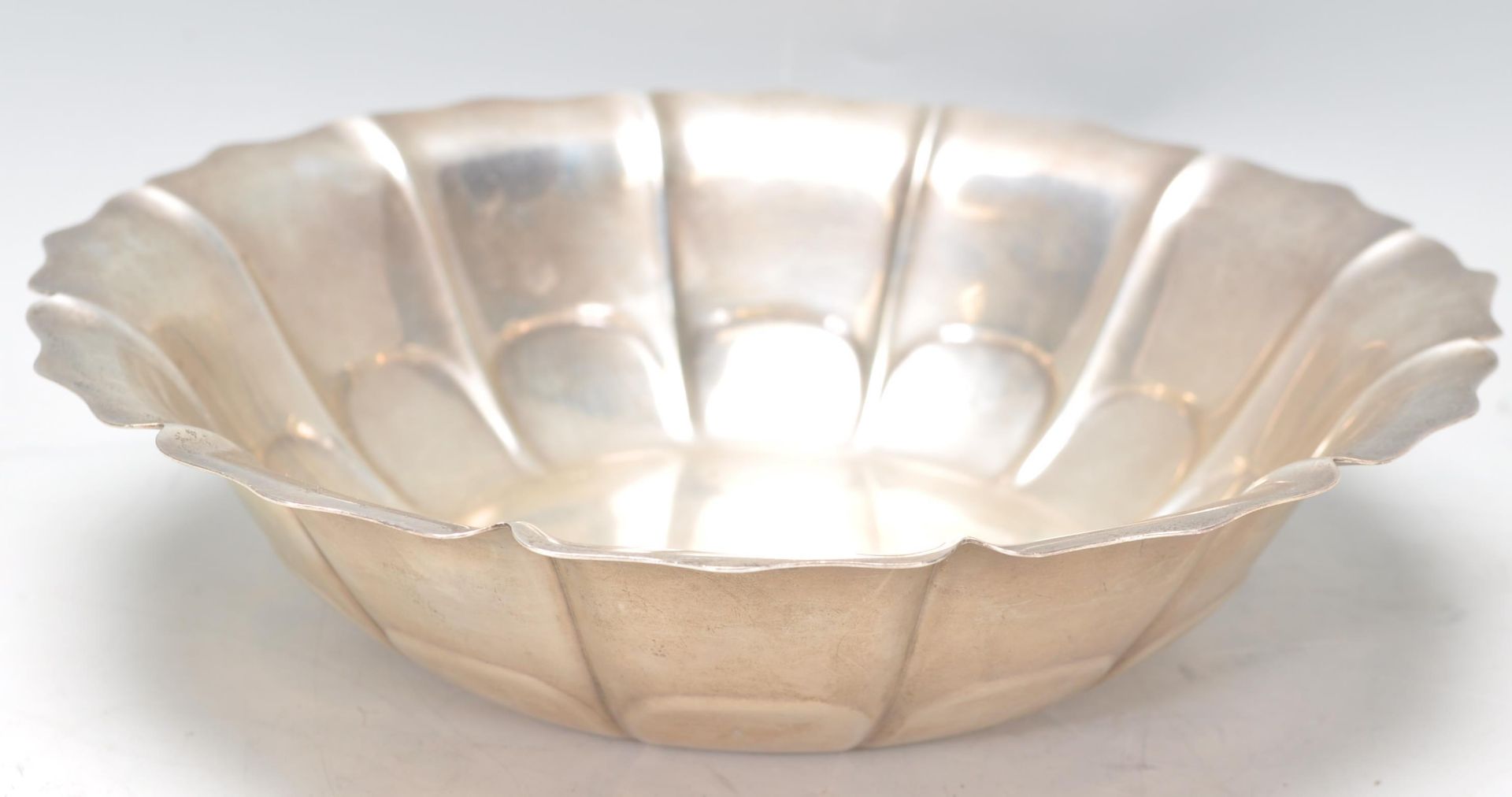 A sterling silver Reed & Barton centrepiece bowl having moulded and shaped sides with engraved