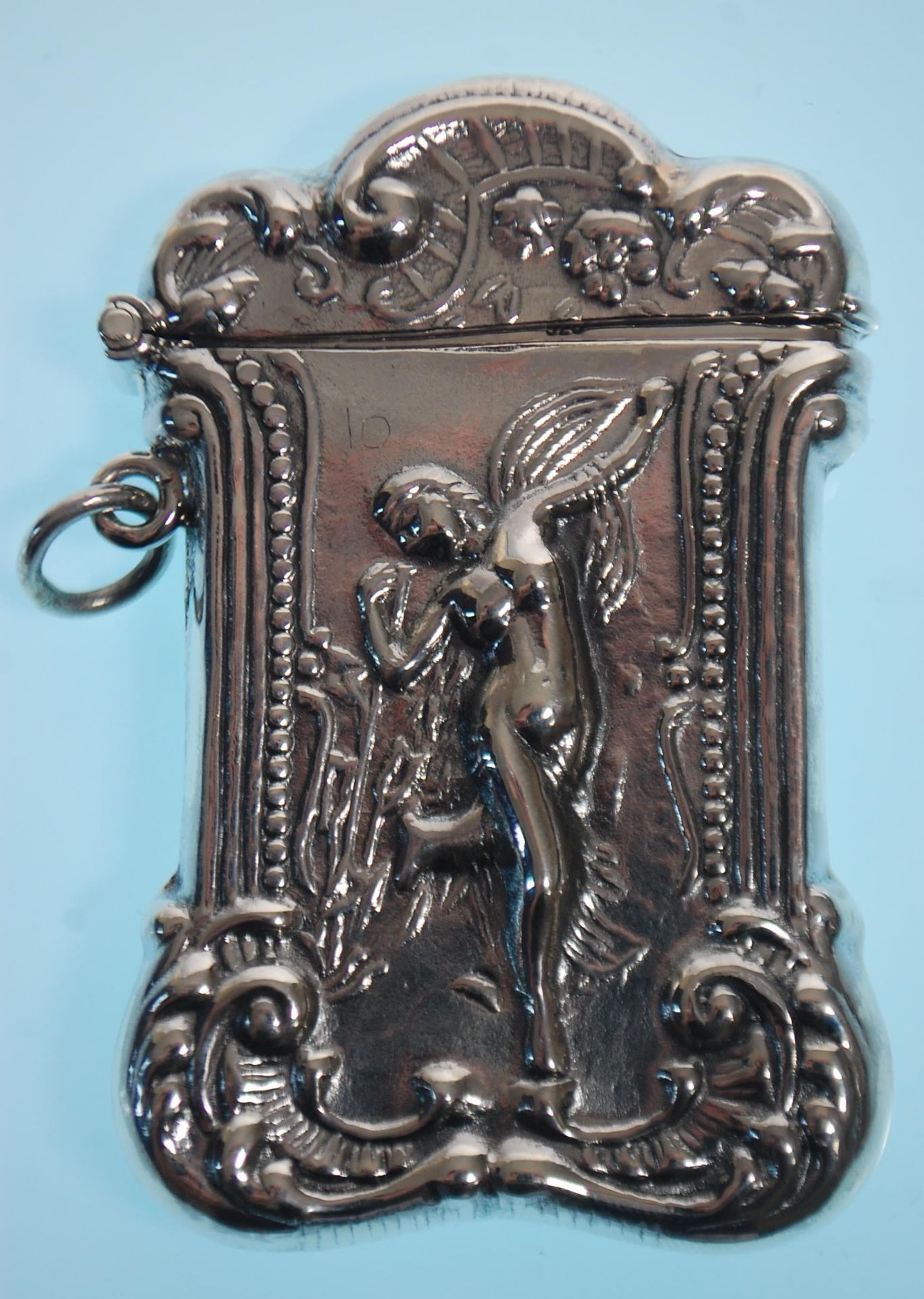 A stamped 925 silver vesta case having a repousse decoration fairy with scrolled borders. Measures - Image 2 of 7