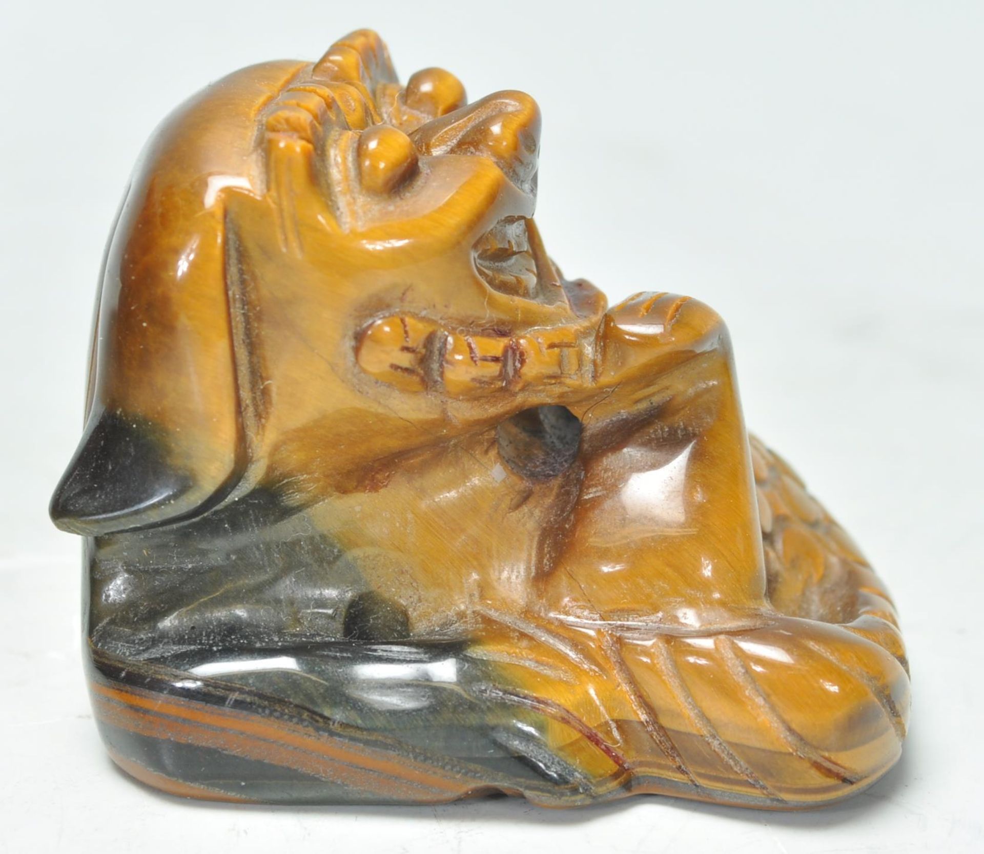 A good early 20th Century Chinese tigers eyes carved figure of a fu dog. Measures 5 cm tall by 5 - Bild 2 aus 7