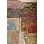 A collection of Persian and Islamic rugs from the 20th century to include oval red medallion, blue