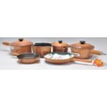 Le Creuset - A set of five graduating cast iron French saucepans and lids ( one lid missing ),