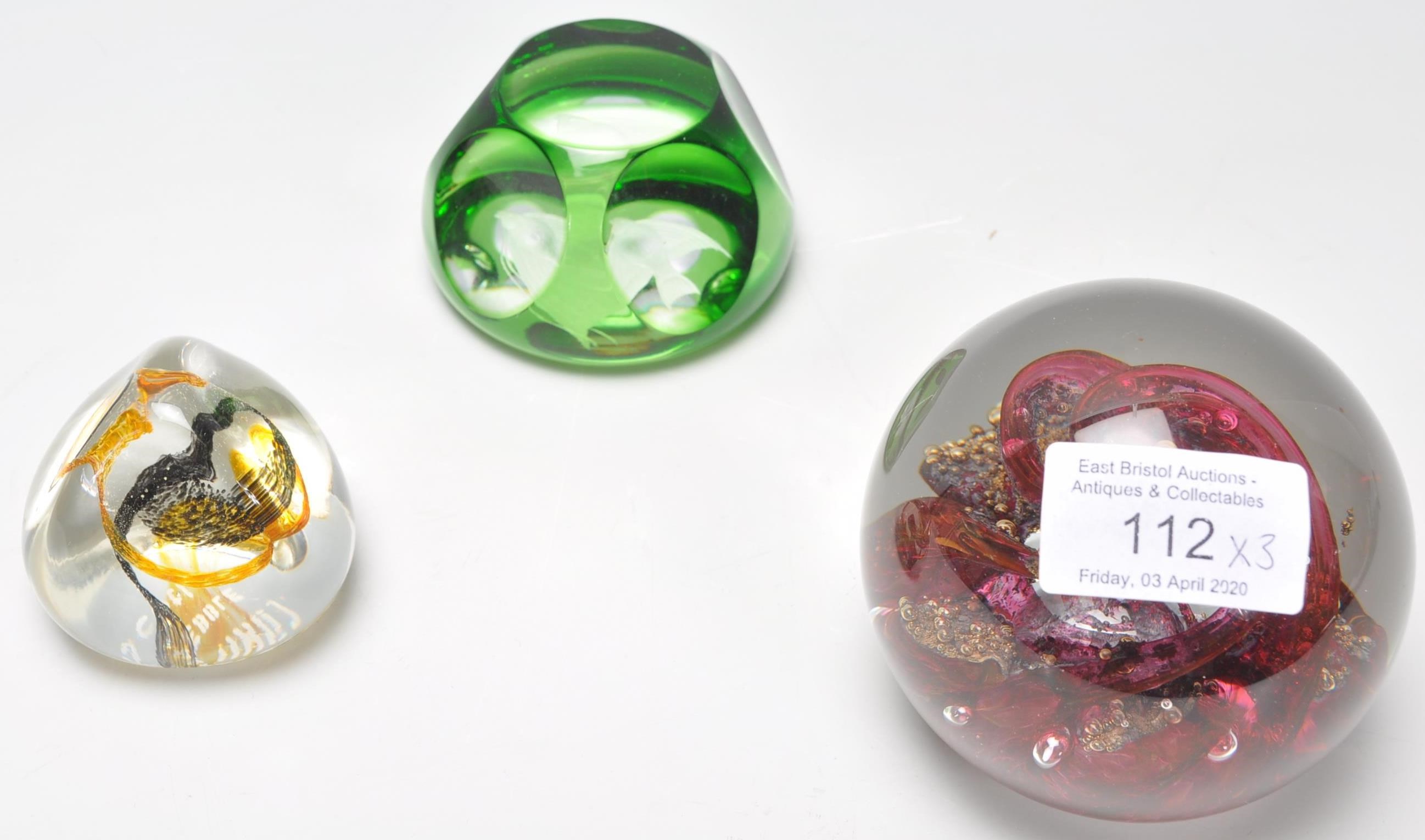 A group of four paper weights to include a Selkirk Scottish paper weight of red swirl design (signed - Image 2 of 7