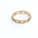 A ladies 18ct gold full eternity ring having round cut diamonds set within two gold bands. Weight