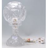A lovely early 20th Century Edwardian cut glass table lamp having a cut glass round shade.