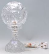 A lovely early 20th Century Edwardian cut glass table lamp having a cut glass round shade.