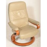 Himolla - A good Himolla Germany reclining swivel armchair upholstered in cream leather with show