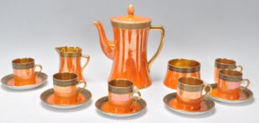 A vintage retro 1930's Carlton Ware coffee service having a lustre glaze consisting of coffee pot,