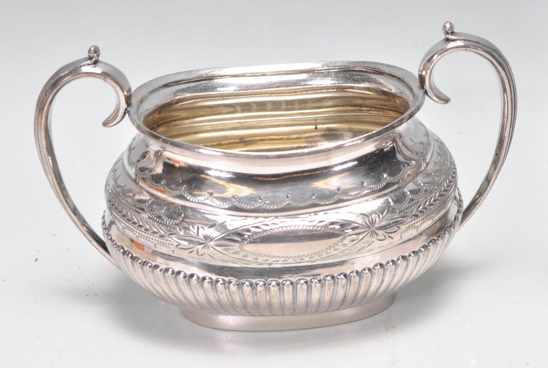 A late 19th century / early 20th century silver plate 3 tea service comprising teapot, sugar bowl - Image 2 of 11