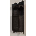 A 19th Century Victorian hanging corner cupboard having open shelf space above a cupboard below with