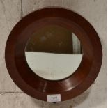 A 19th Century Victorian porthole  wall mirror of small proportions having a round mahogany frame