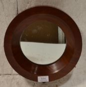 A 19th Century Victorian porthole  wall mirror of small proportions having a round mahogany frame