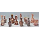 A collection of Murano 'end of day' studio art glass to include speckled vases and jugs with