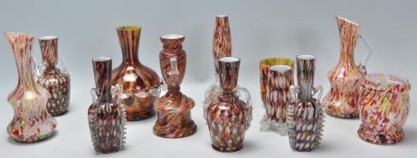 A collection of Murano 'end of day' studio art glass to include speckled vases and jugs with